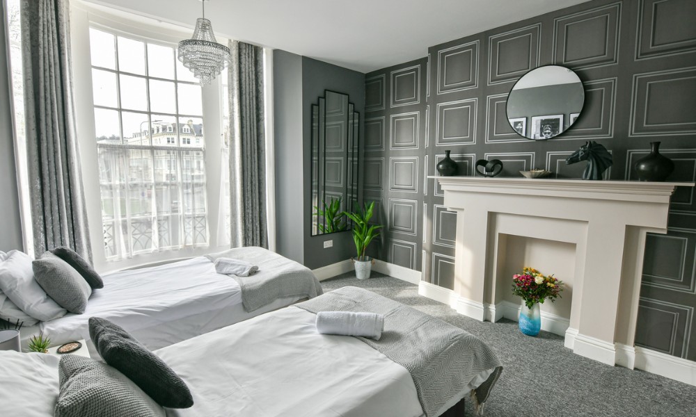 Stylish first floor bedroom with two single beds